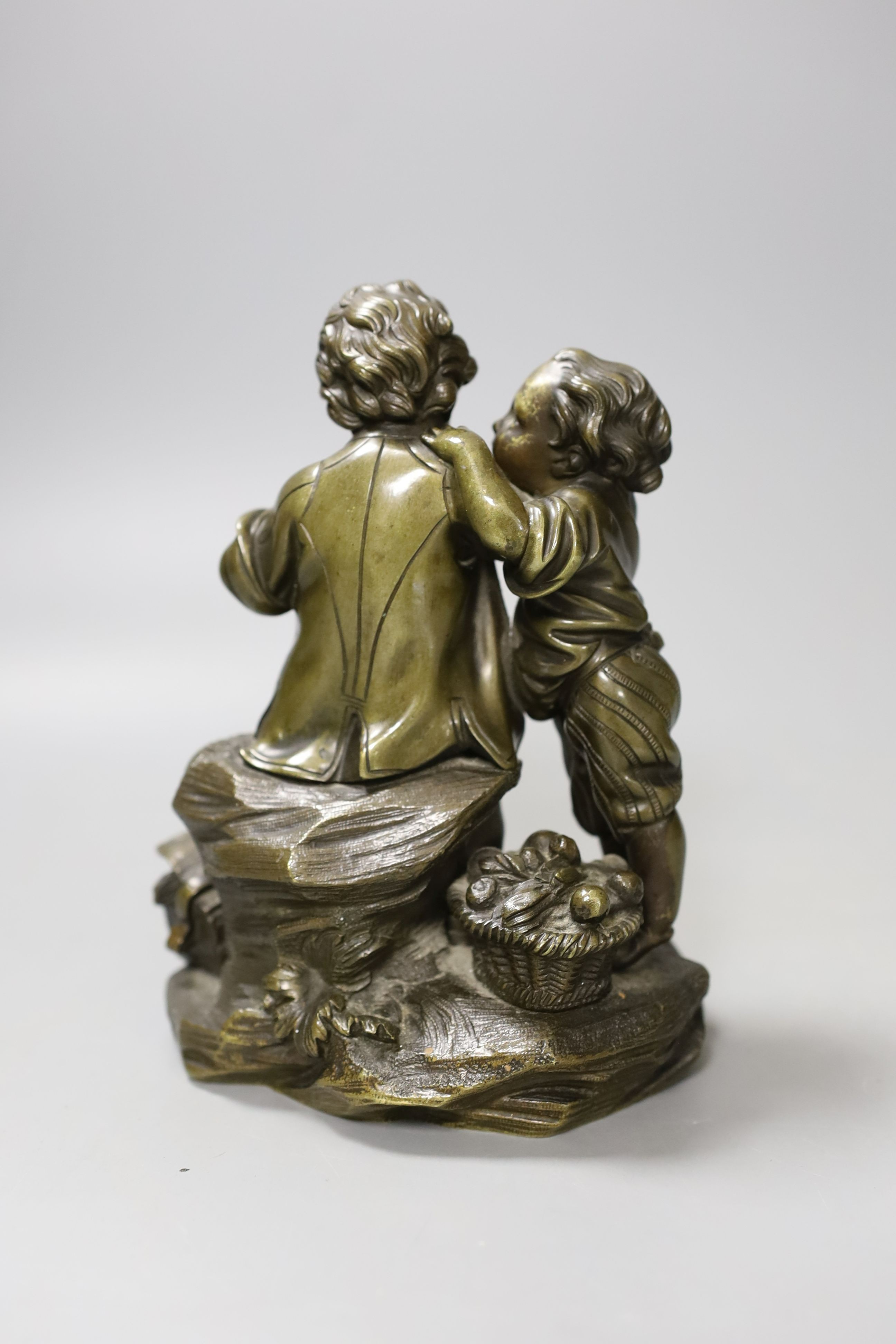 A Victorian cast bronze child figure group - 17cm tall